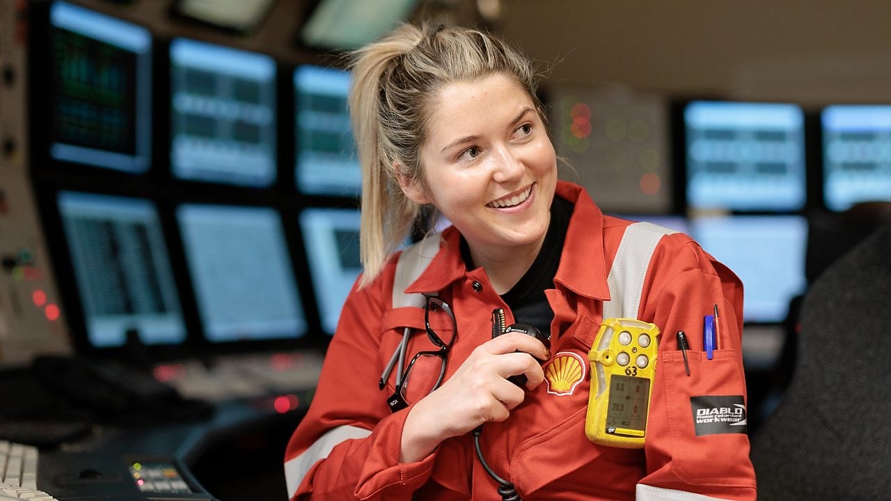Girl showing Shell brand logo