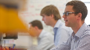 Shell Shipping and Trading staff at work in an office on The Strand, London
