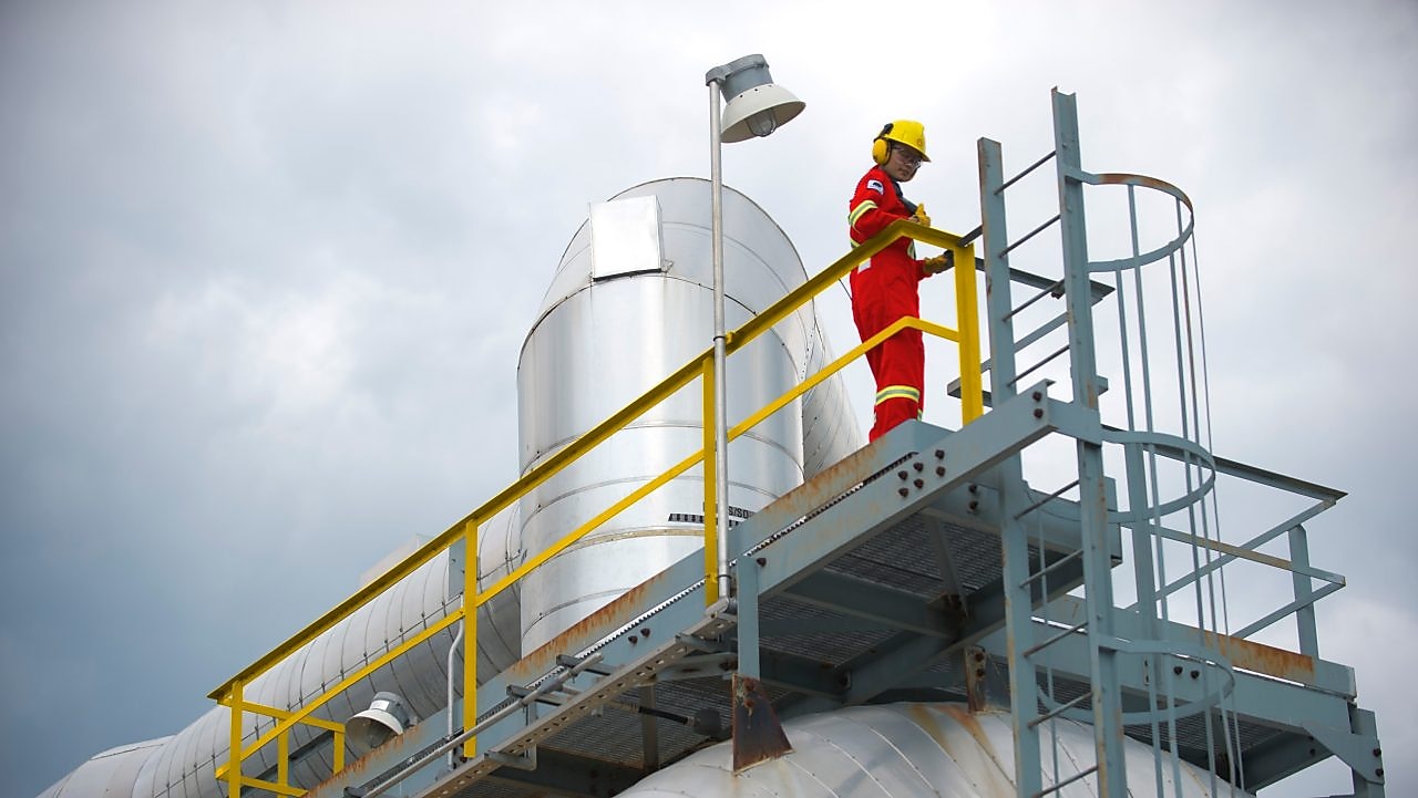 Employee on Caroline Sulphur Plant's Sulphur tank