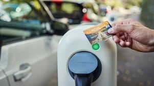 Charging card against charger for electric vehicle