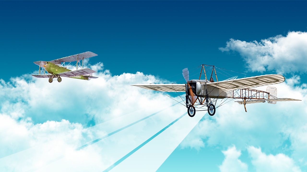 Two planes are flying in the sky