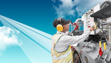 Man is working on machinary
