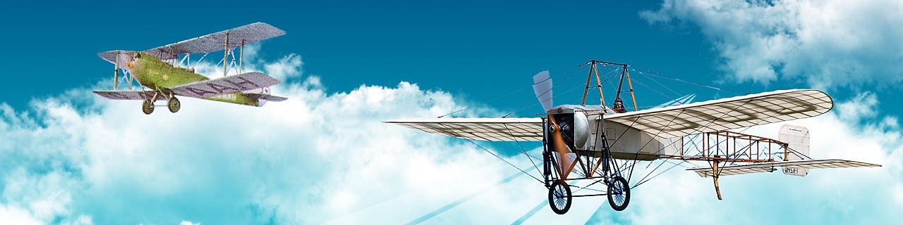 Two planes are flying in the sky