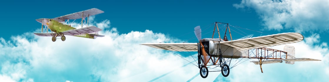 Two planes are flying in the sky