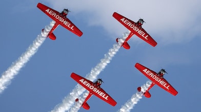 The Aeroshell Aerobatic Team gets into formation
