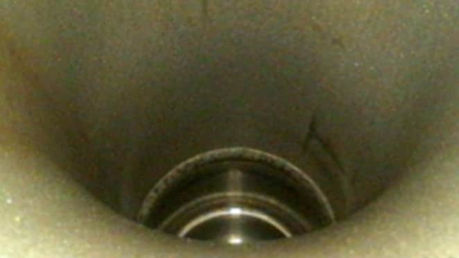 Borescope inspection image of an engine’s oil scavenge tube showing negligible levels of carbon deposits.