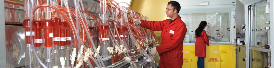 Scientist formulating and performing oxidation testing on aviation engine oil samples