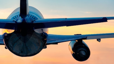 Plane in sky.