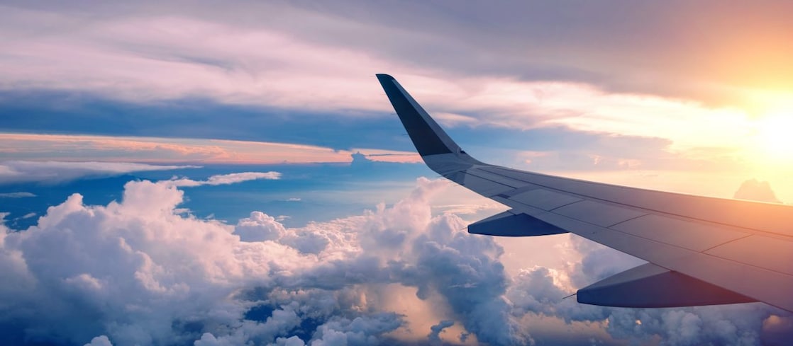 View over the plane window at sunset