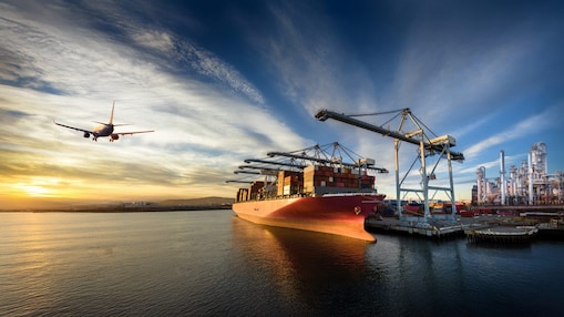 A composite image showing an airplane flying over water at sunset, a large cargo ship docked at a container port, and an industrial refinery complex on the right.