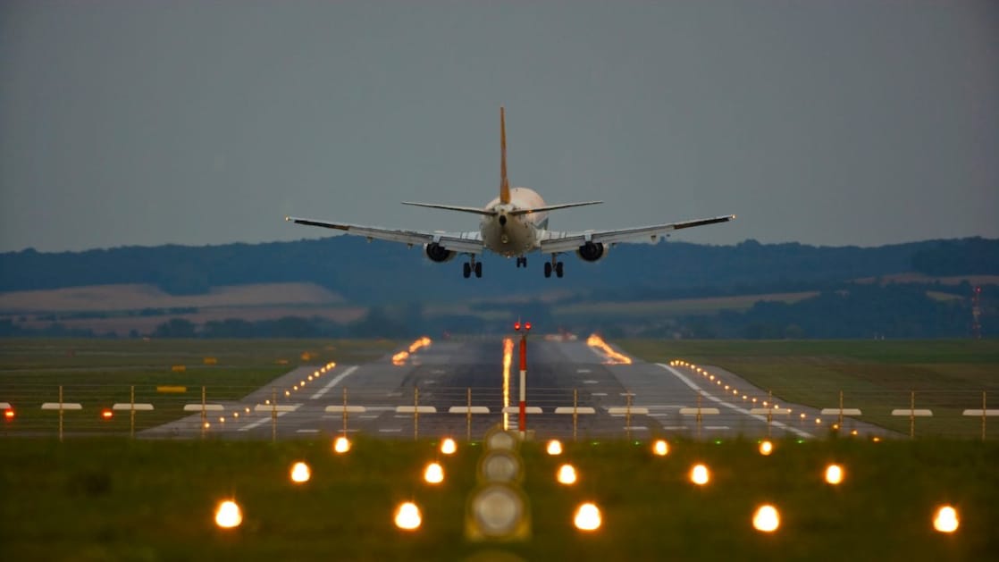 Plane landing on runway