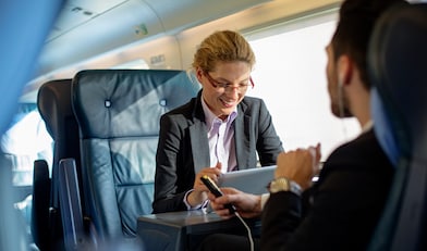 persons talking inside flight