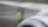 A man in hi-vis services a plane wing
