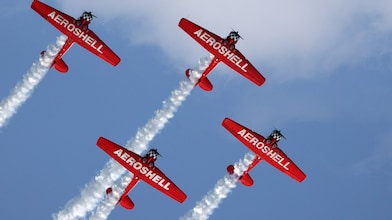 AeroShell aerobatic team performing flyover