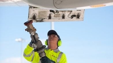 Shell employee developing and testing a safe unleaded fuel