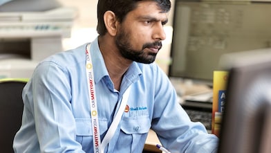 Scientist formulating and performing oxidation testing on aviation engine oil samples