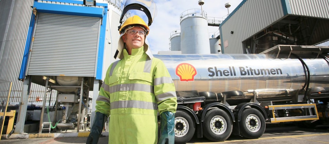 Truck driver with Shell bitumen tank