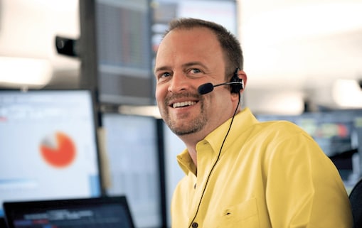 Man wearing headphones looking at camera