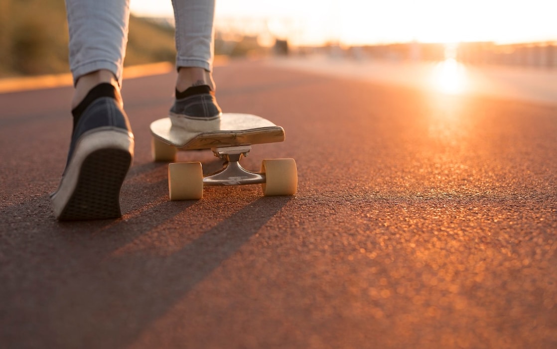 a person skating on a road
