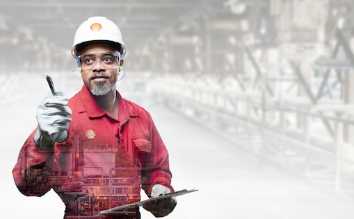 shell engineer in red uniform holding notepad and pen