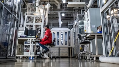 Shell Technology Centre, Bangalore. A Shell scientist working at computer Bangalore, India, 2018