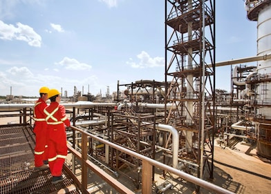 Workers survey a portion of the Quest unit at the Scotford Upgrader