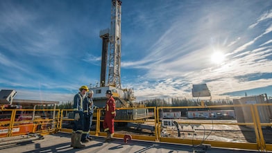 Shell gas processing three shell employee working
