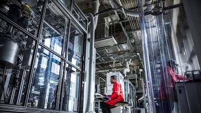 shell employee operating laptop