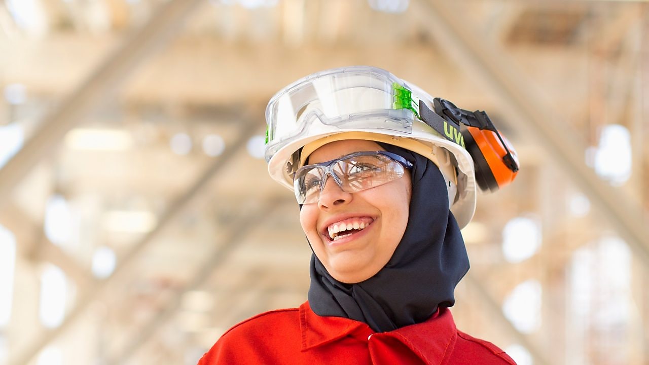 Shell employee smiles at the Effluent Treatment plant using the OMEGA process