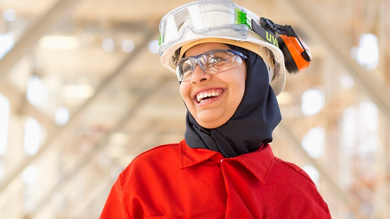 Shell employee smiles at the Effluent Treatment plant using the OMEGA process
