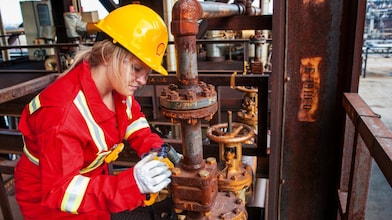 Onsite engineer completing gasification technology maintenance