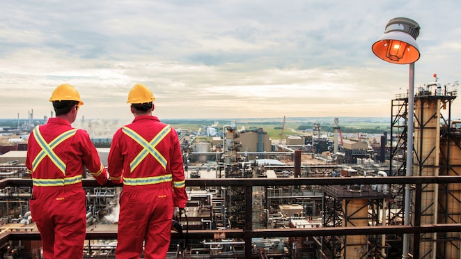 two workers in Scotford Manufacturing facility Canada