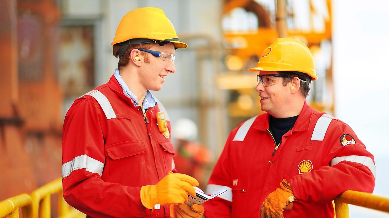 two employees talking