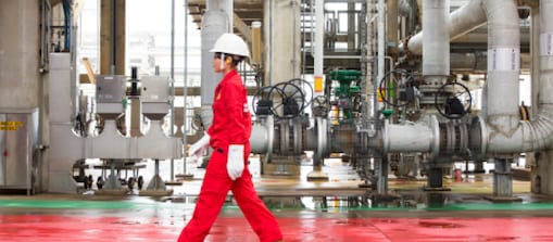 worker walking through plant