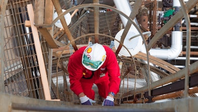Shell employee entering structure
