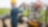On a farm, a man operates a machine
