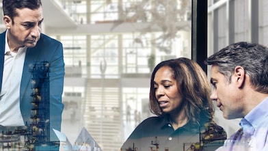 A group of employees is having a conversation