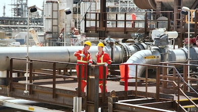 Two workers at site