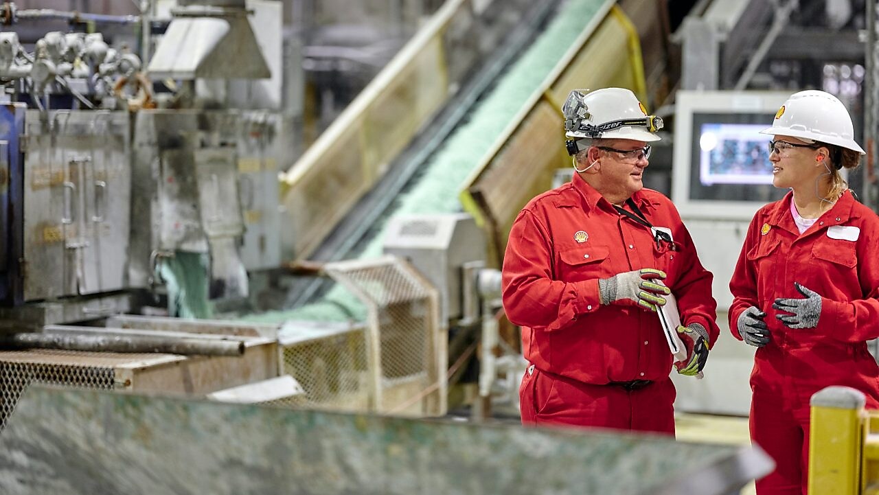 Two engineers are having a conversation