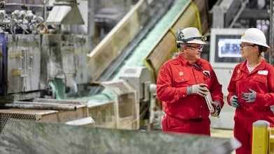 Two engineers are having a conversation