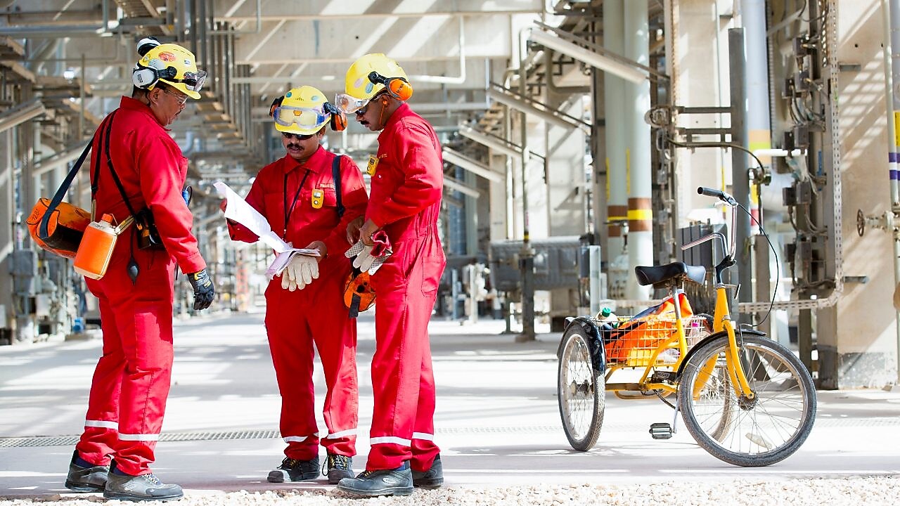 Three engineers are having a discussion