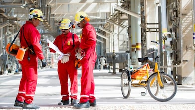 Three engineers are having a discussion