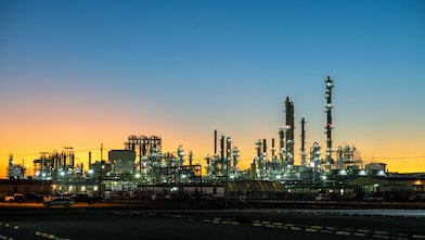 A chemical manufacturing plant at dawn.