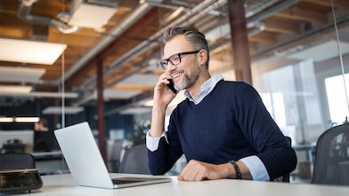 A man on the phone with Shell Chemicals