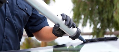 Man applying caulk