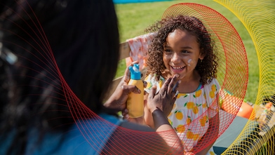 mom putting sunblock