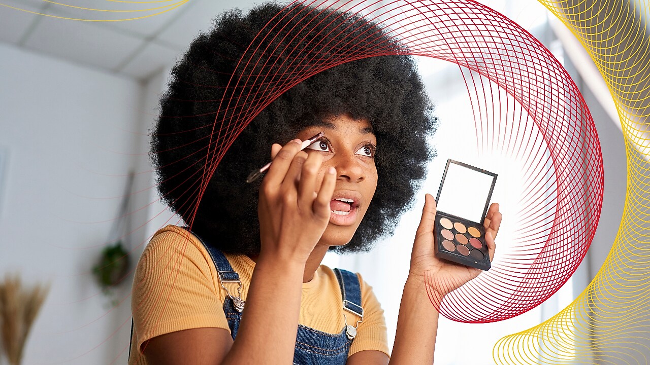 a lady putting makeup
