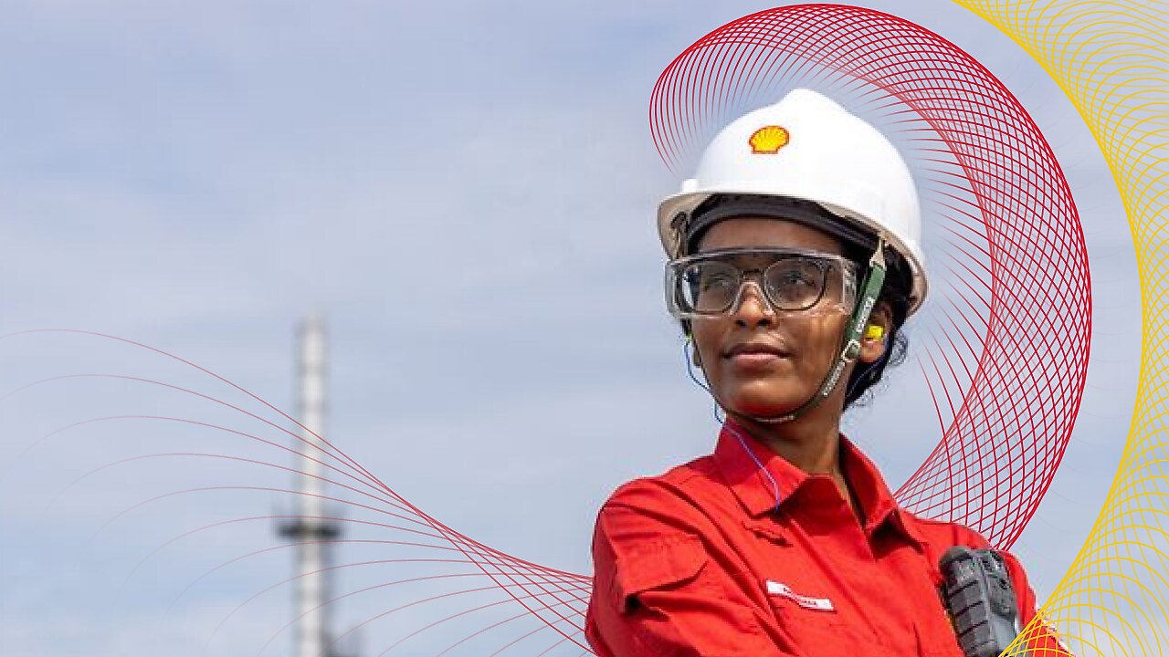 a woman with a Shell Chemicals helmet