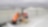 Two workman fixing a lid on a tank at a chemical plant