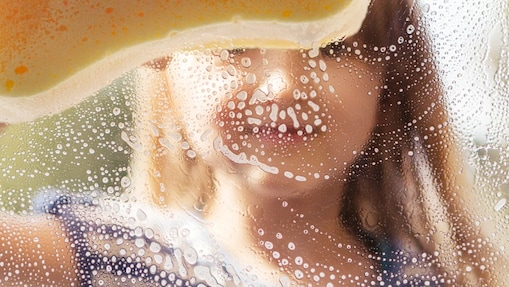 Girl washing glass